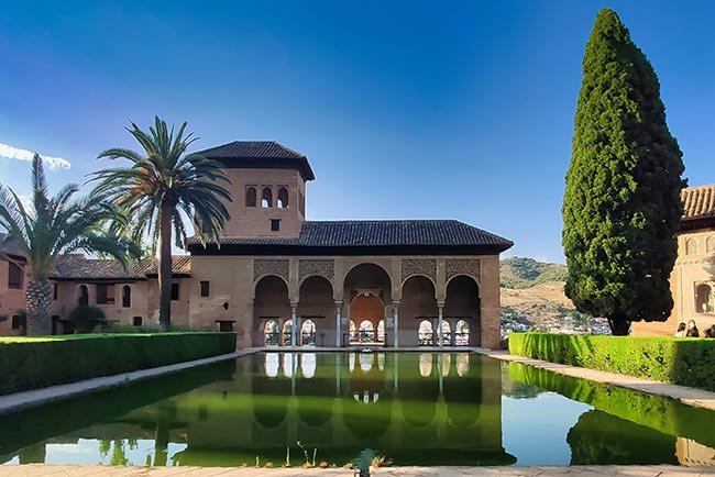 He is not a full man who does not own a piece of land. House with arches